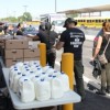 Cicero Officials Join Food Drive Effort at Unity Junior High School