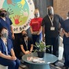 Las Pruebas de COVID-19 del Personal Pueden Mantener Nuestras Escuelas Seguras: Programa Piloto de It Takes a Village Family of Schools & UI Health