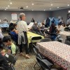 Top Box Foods e Illinois Iranian Alliance Sirven Comidas de Acción de Gracias en Refugios para Migrantes en Toda la Ciudad
