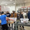 Volunteers Prepare 1,200 Dinner Baskets for Lou Malnati’s 17th Annual Thanksgiving Basket Drive